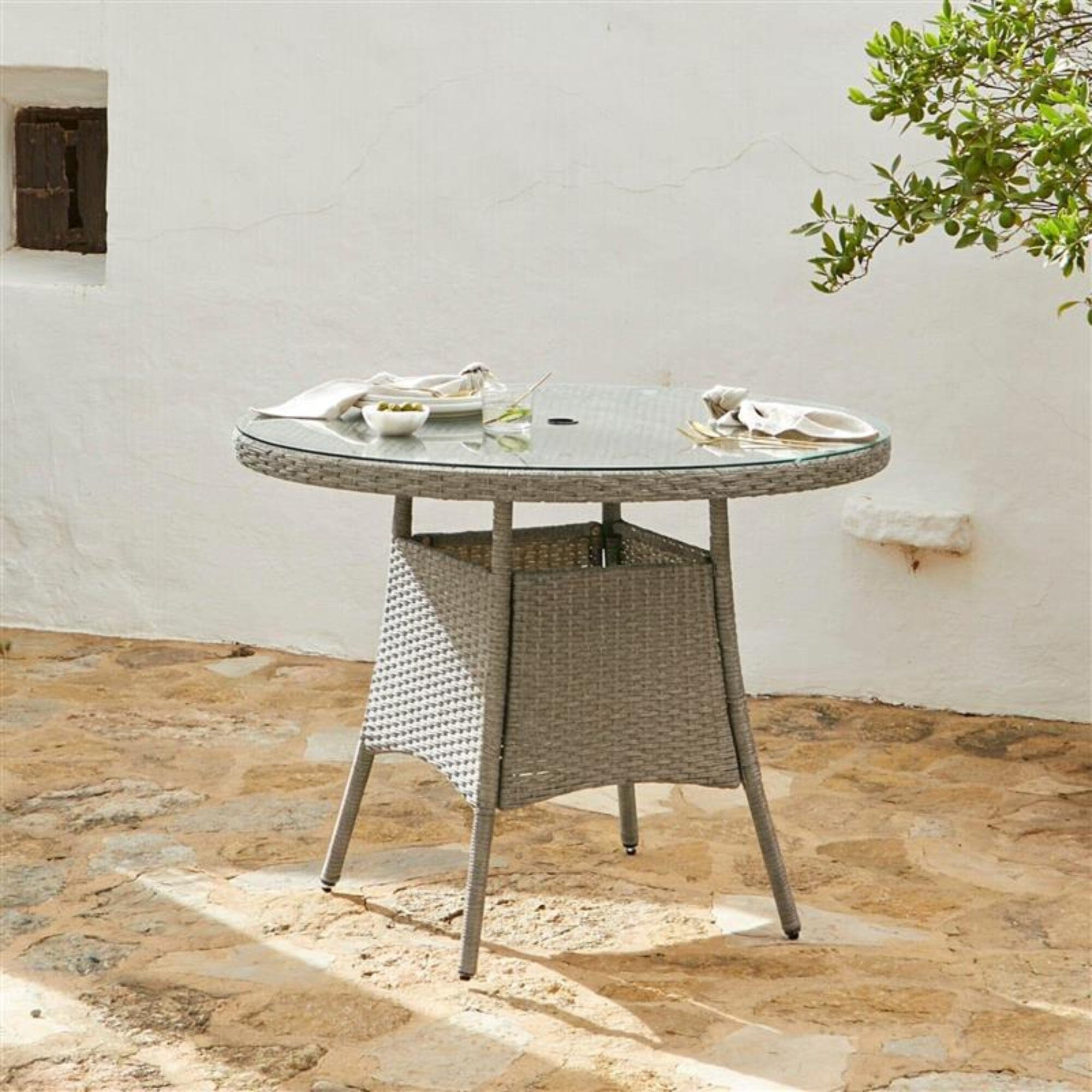 Kemble 4 Seater Round Rattan Garden Dining Table - Light Grey with Clear Glass Top