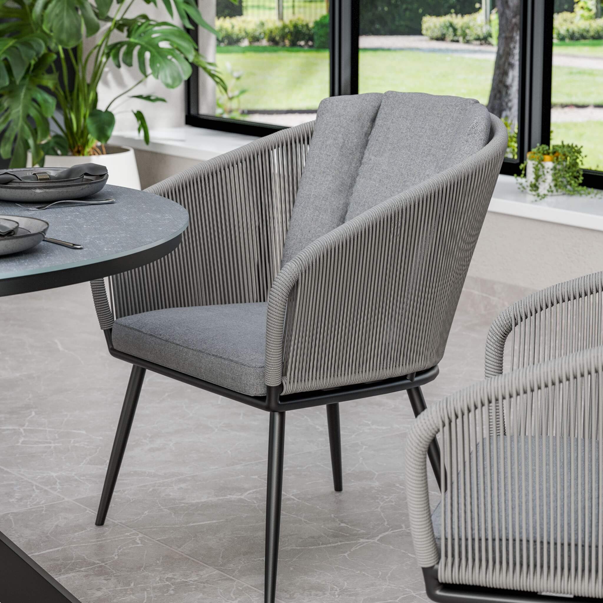 Aspen Outdoor 4 Seater Round Dining Table and Chairs - Grey
